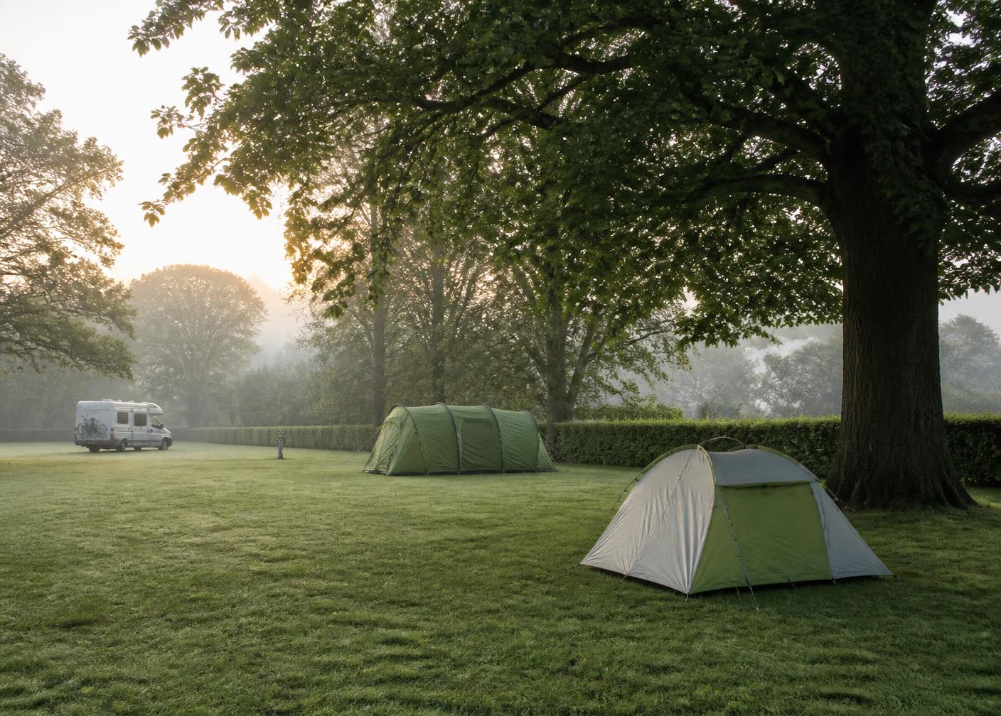 A quiet rural campsite at dawn